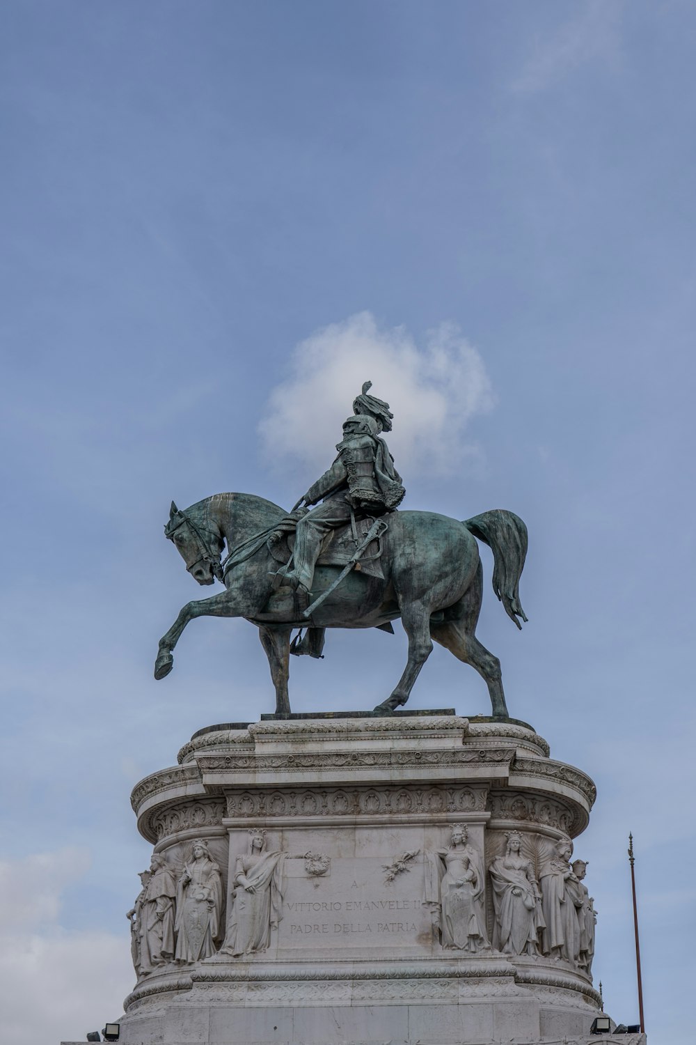 a statue of a man riding a horse