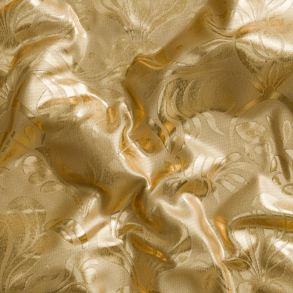 a close up of a shiny gold cloth