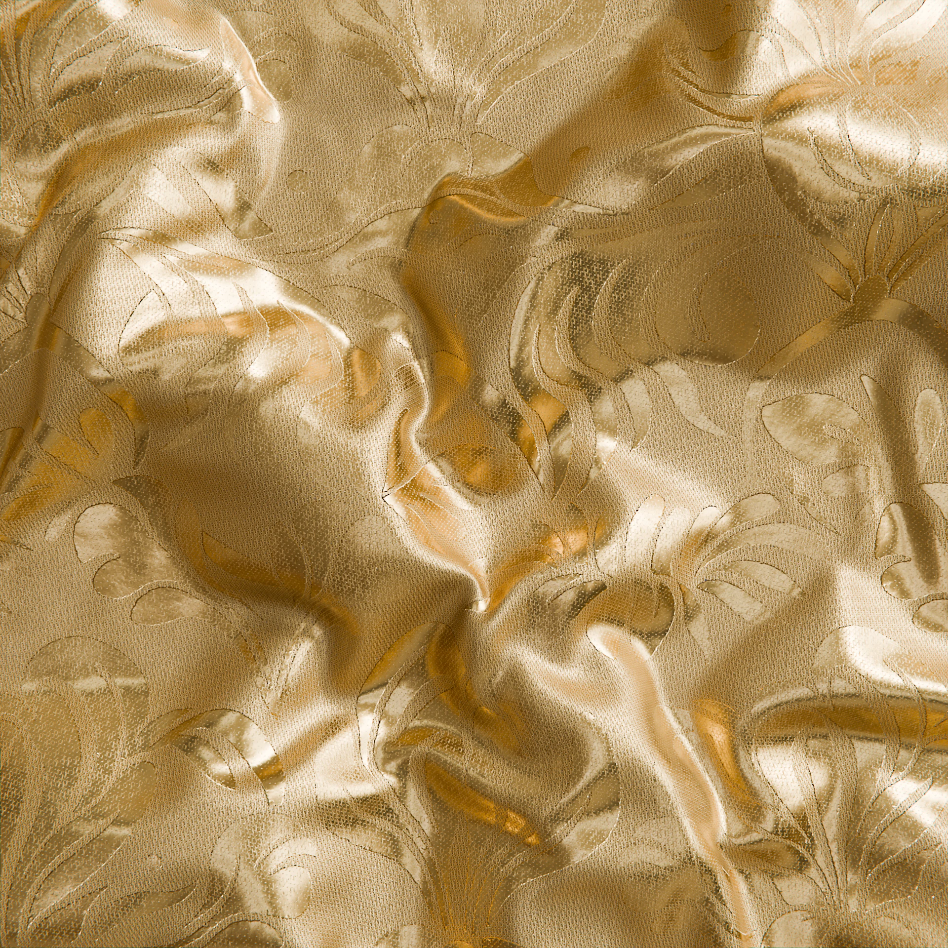 a close up of a shiny gold cloth