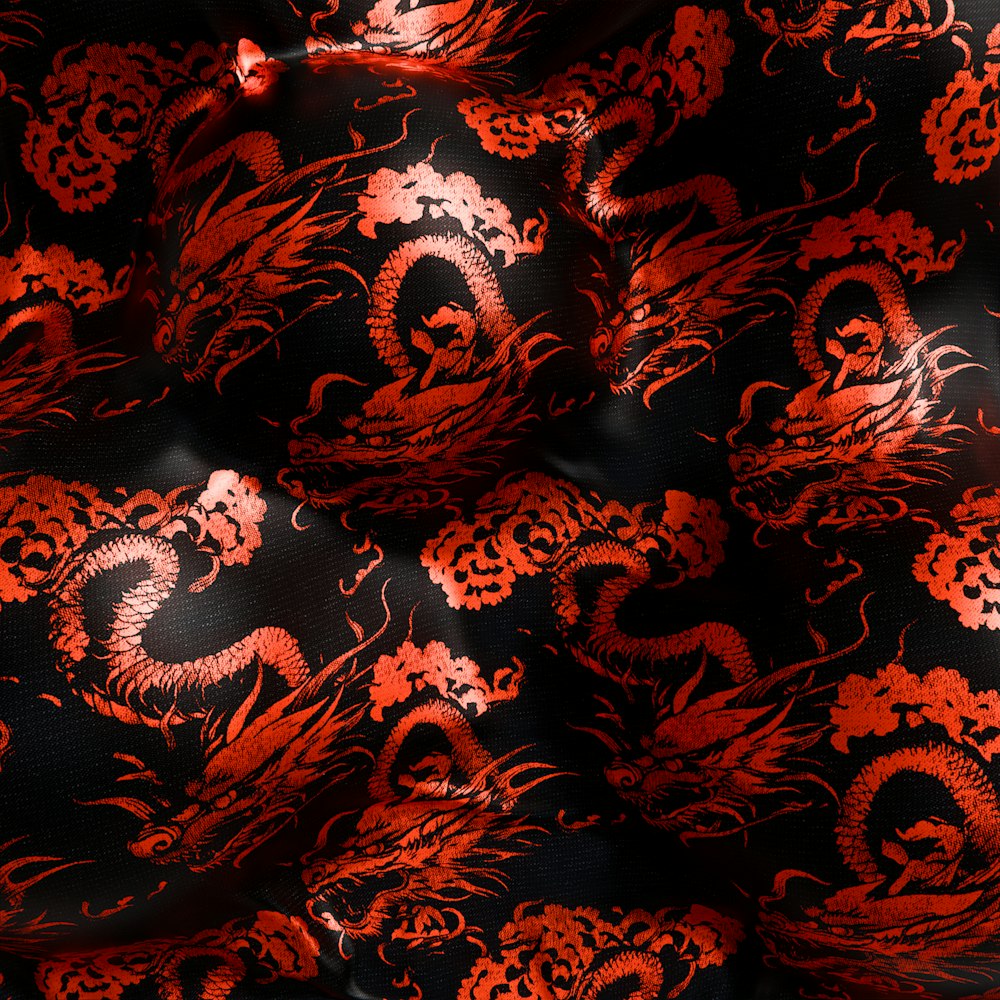 a red and black dragon pattern on a black background