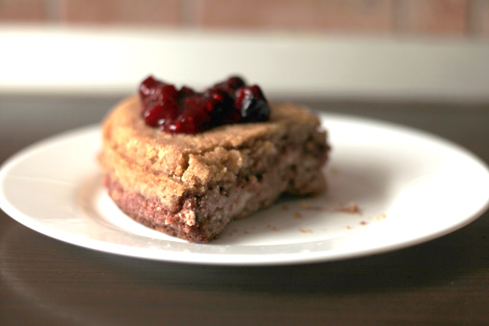 a piece of cake sitting on top of a white plate