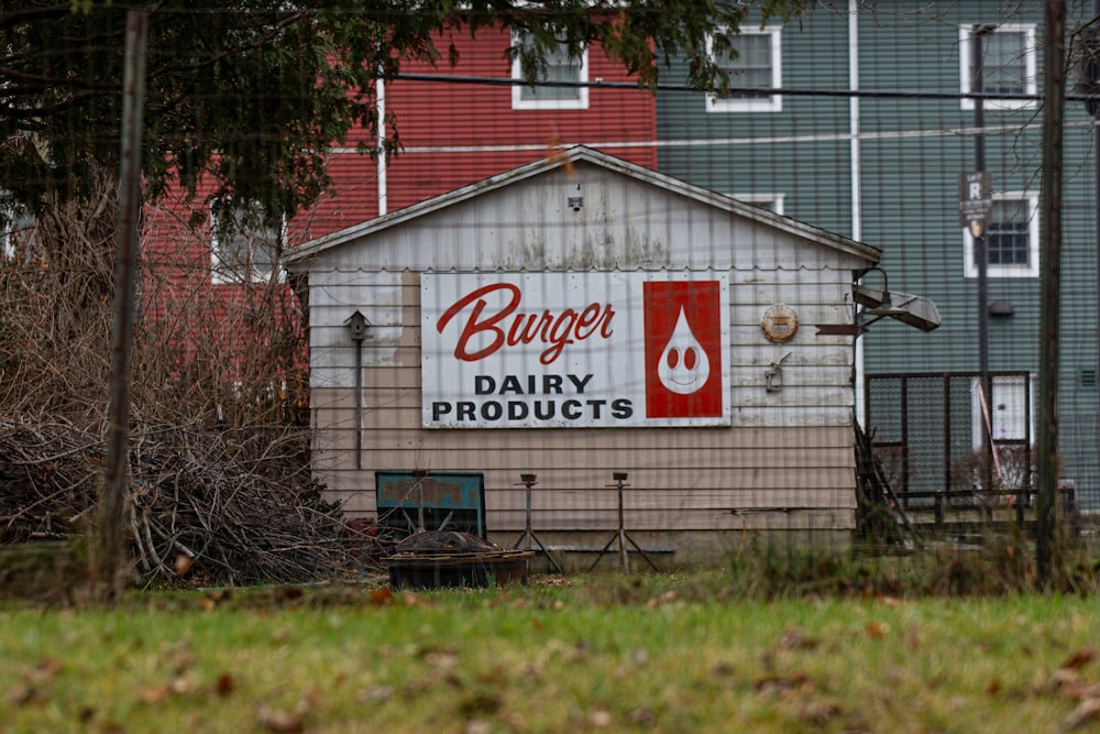 a sign on the side of a building advertising dairy products