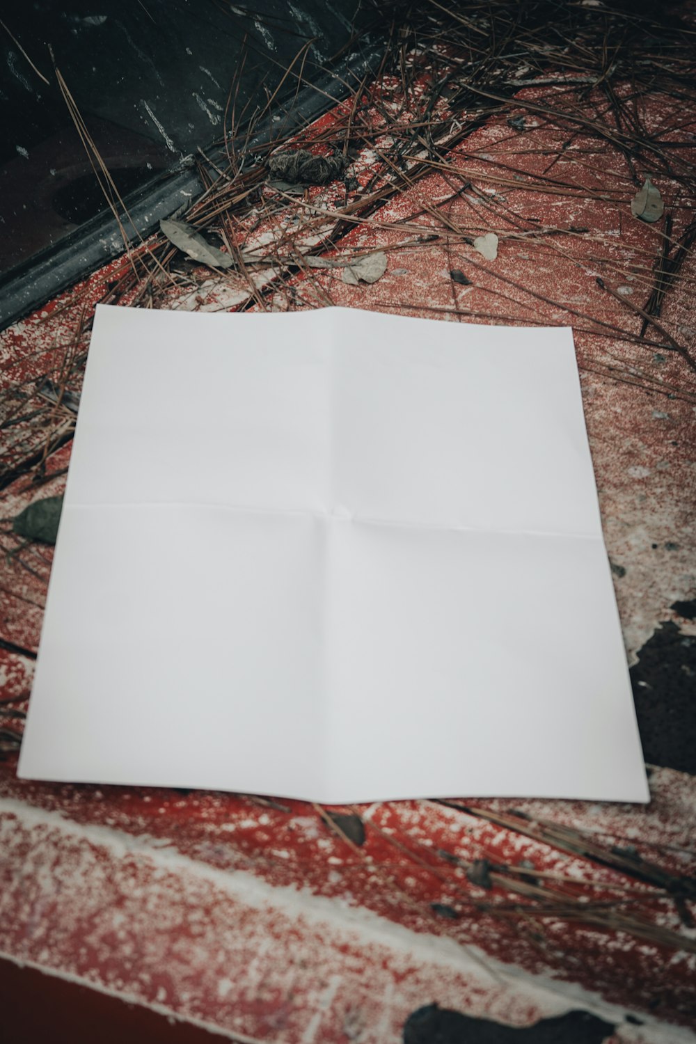 a piece of paper sitting on top of a wooden table