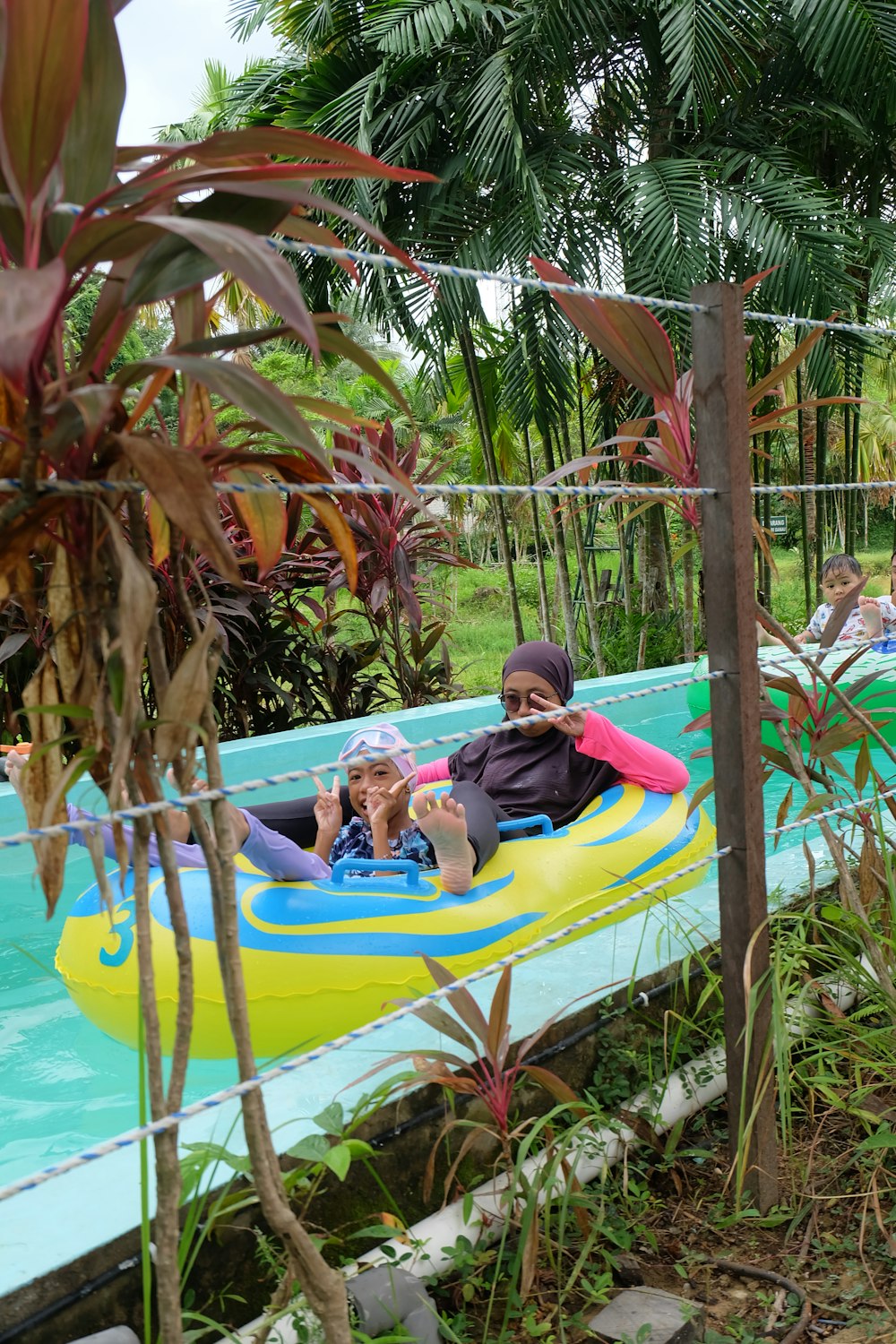 a group of people riding in an inflatable raft