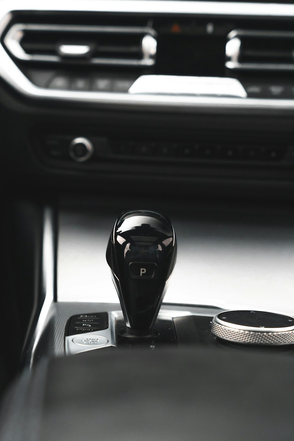 a close up of a steering wheel in a car