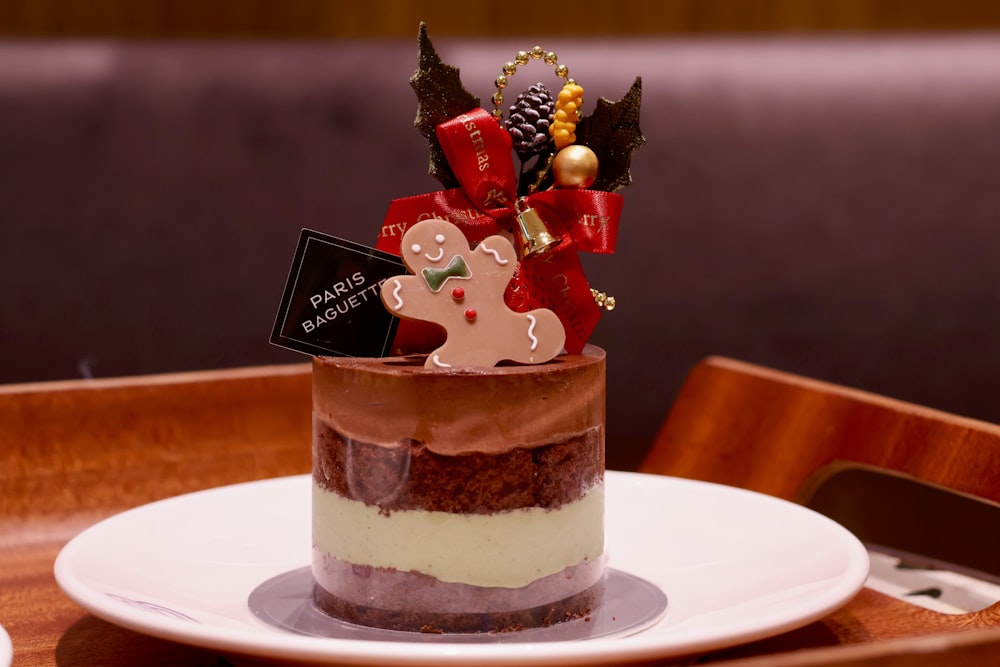 a chocolate cake with white frosting and decorations