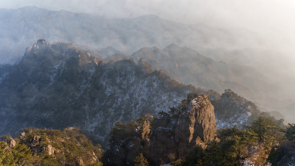 a view of a mountain range covered in snow