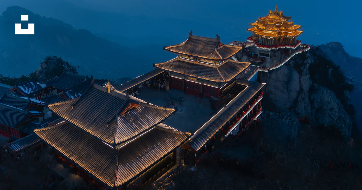 Mount Tai Building A building on top of a mountain with a sky background photo – Free ...
