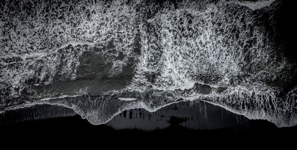 a black and white photo of the ocean