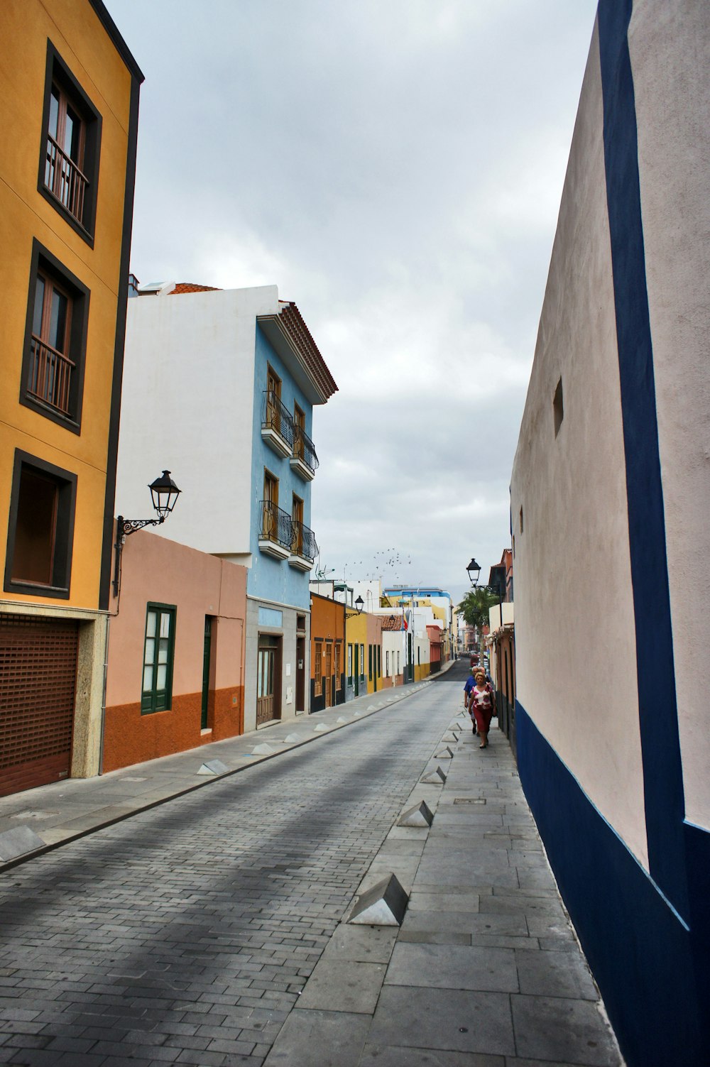 a city street with a few buildings on both sides