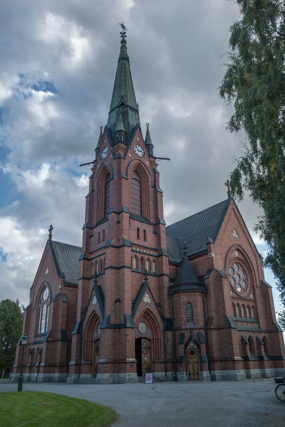 a large church with a clock on the front of it