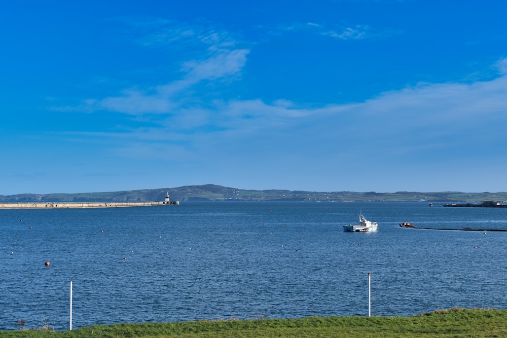 a large body of water with a boat in it