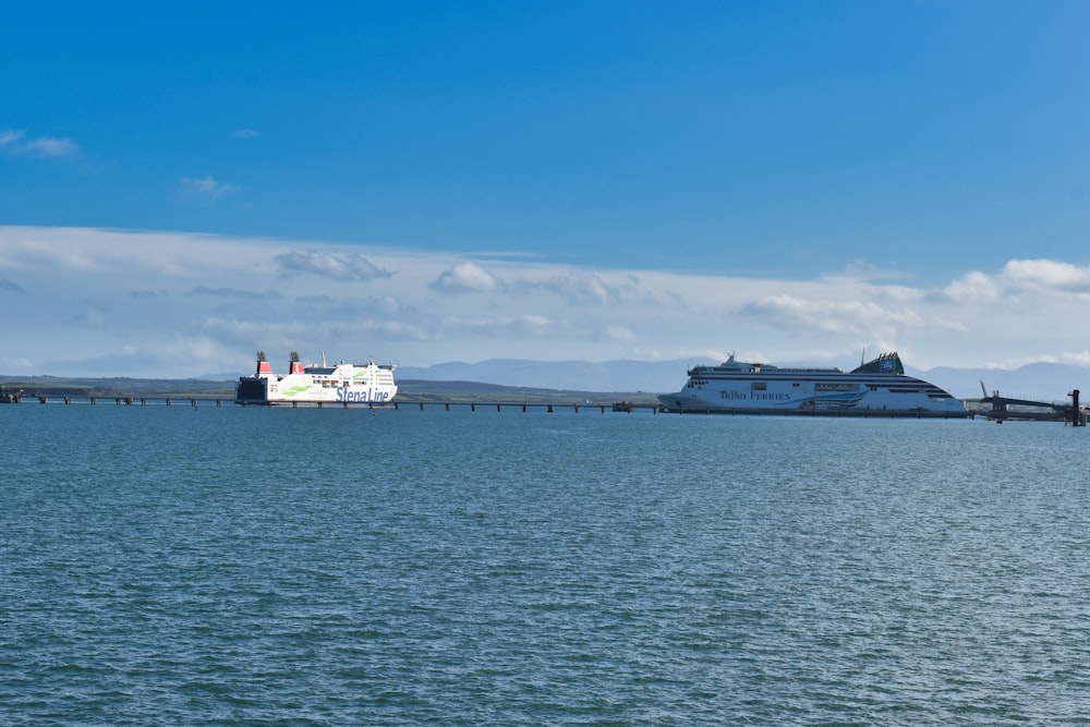 a cruise ship is docked at a pier