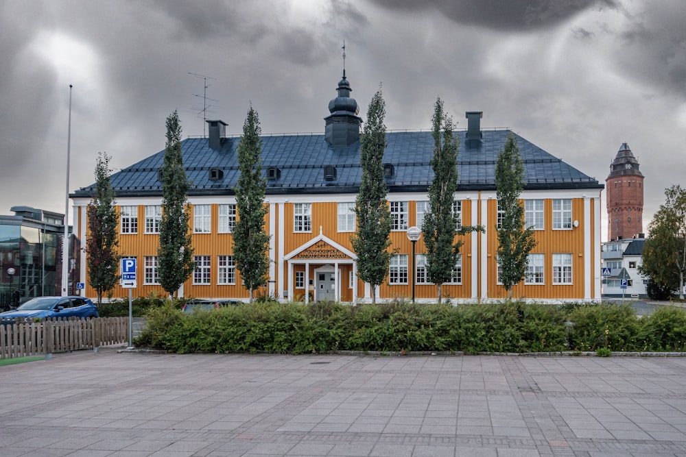 a large building with many windows and a clock tower