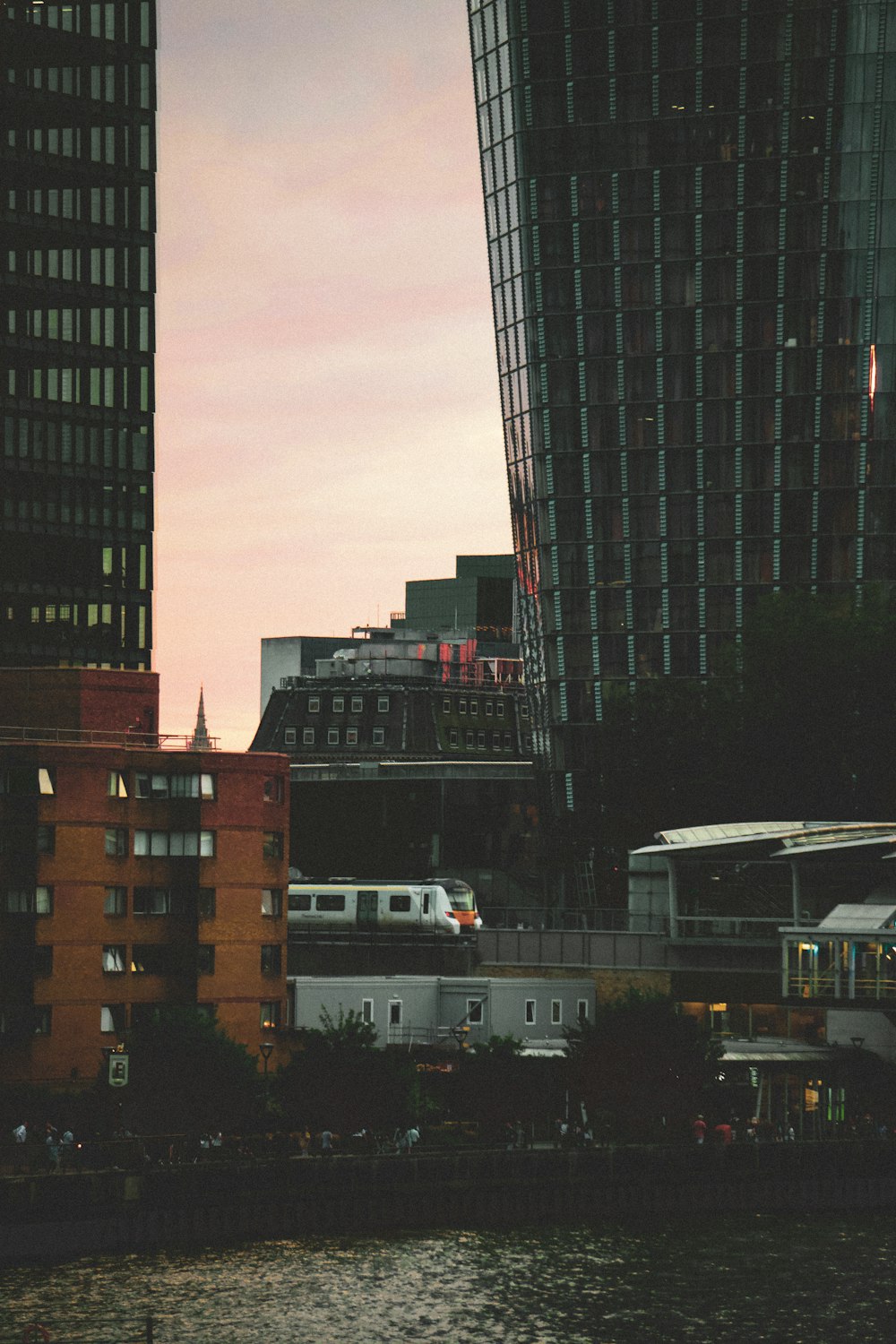 a view of a city with tall buildings