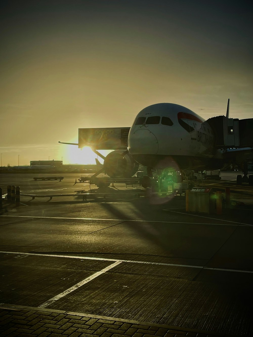 a large jetliner sitting on top of an airport tarmac