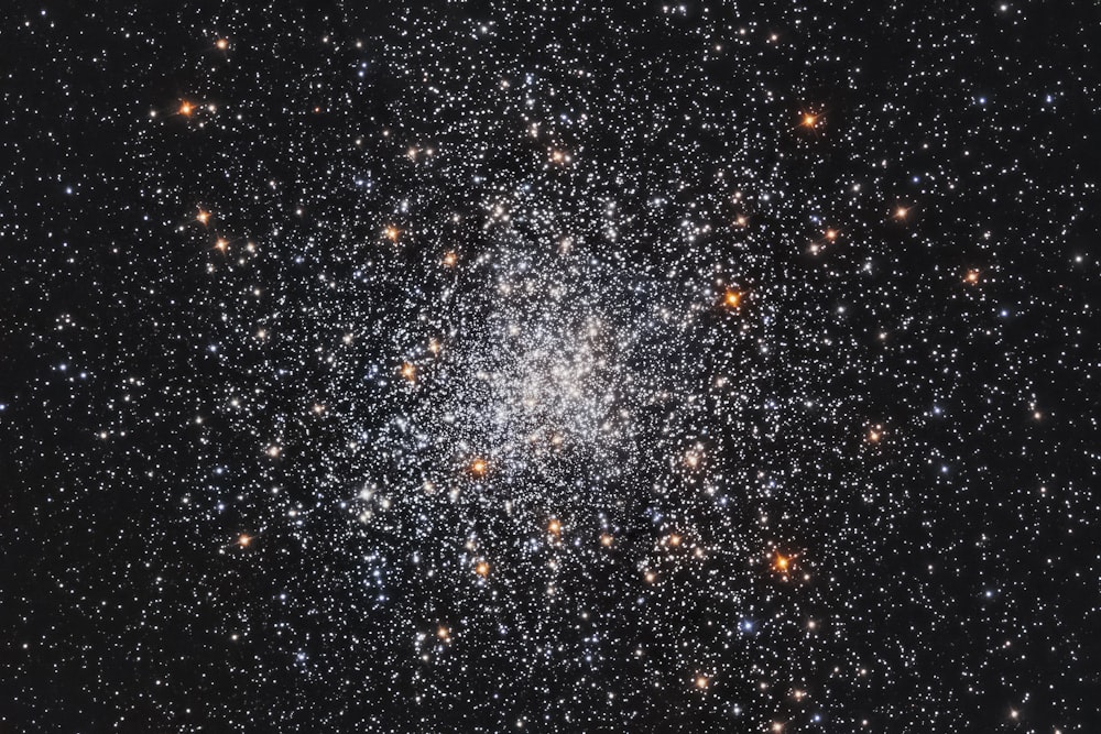 a cluster of stars in the night sky