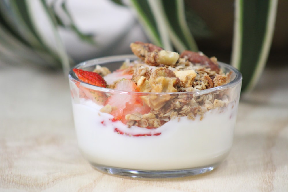 a close up of a bowl of food on a table