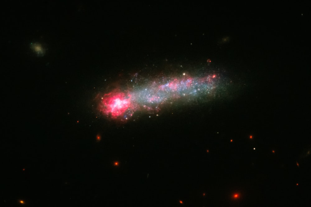 a very large and colorful object in the dark