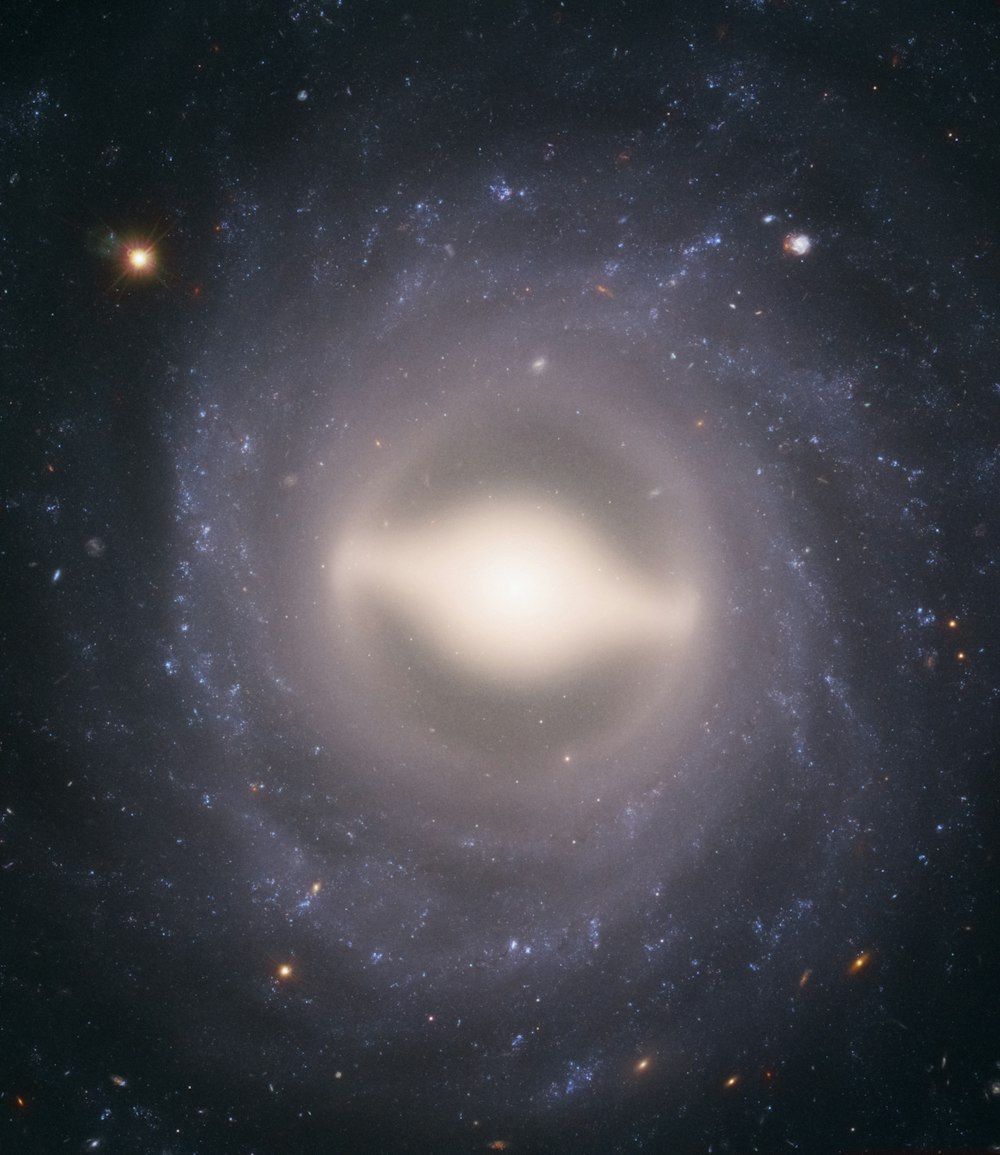 a very large white object in the middle of a galaxy