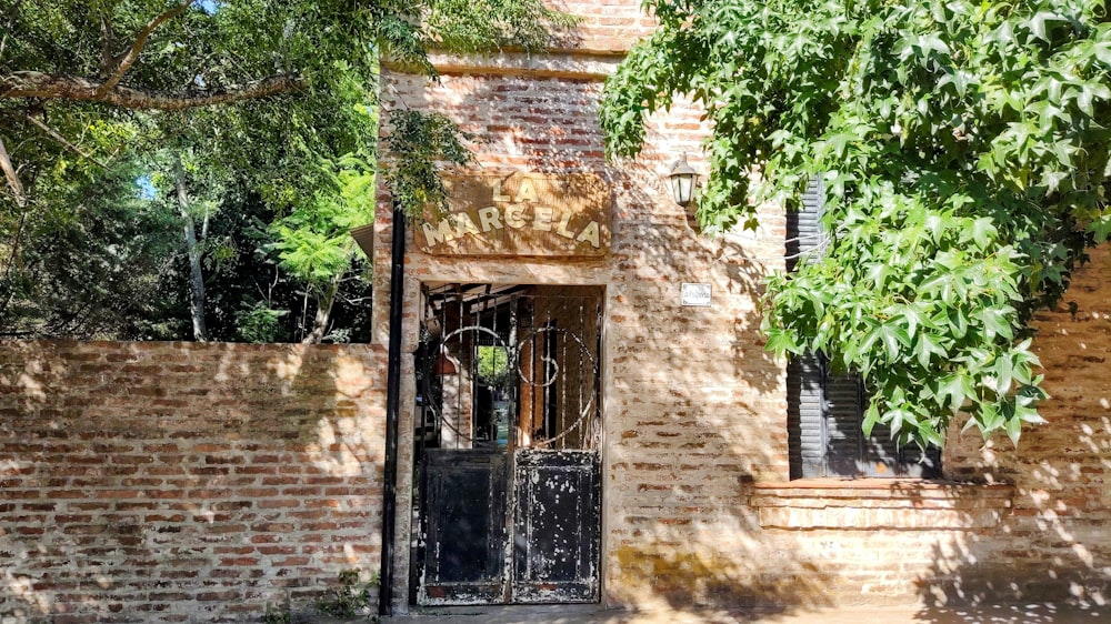 a gated entrance to a brick building