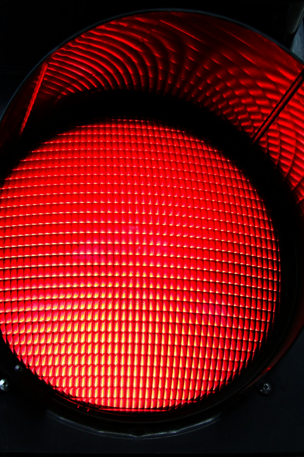 a close up of a traffic light with a red light