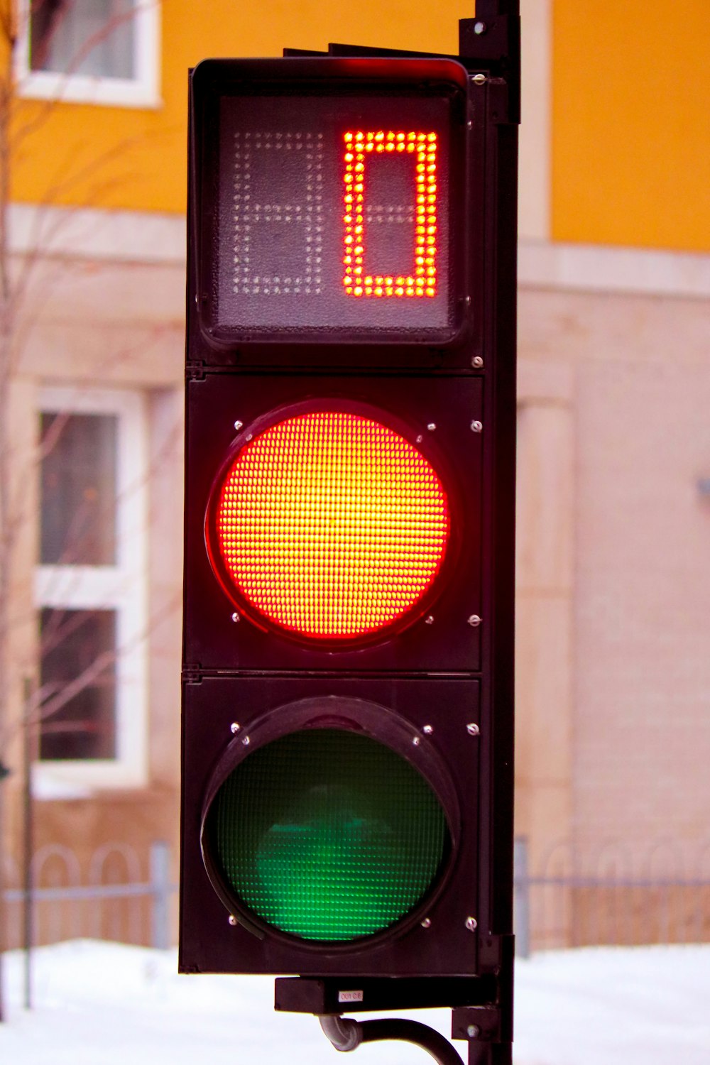 a traffic light with a red and green light