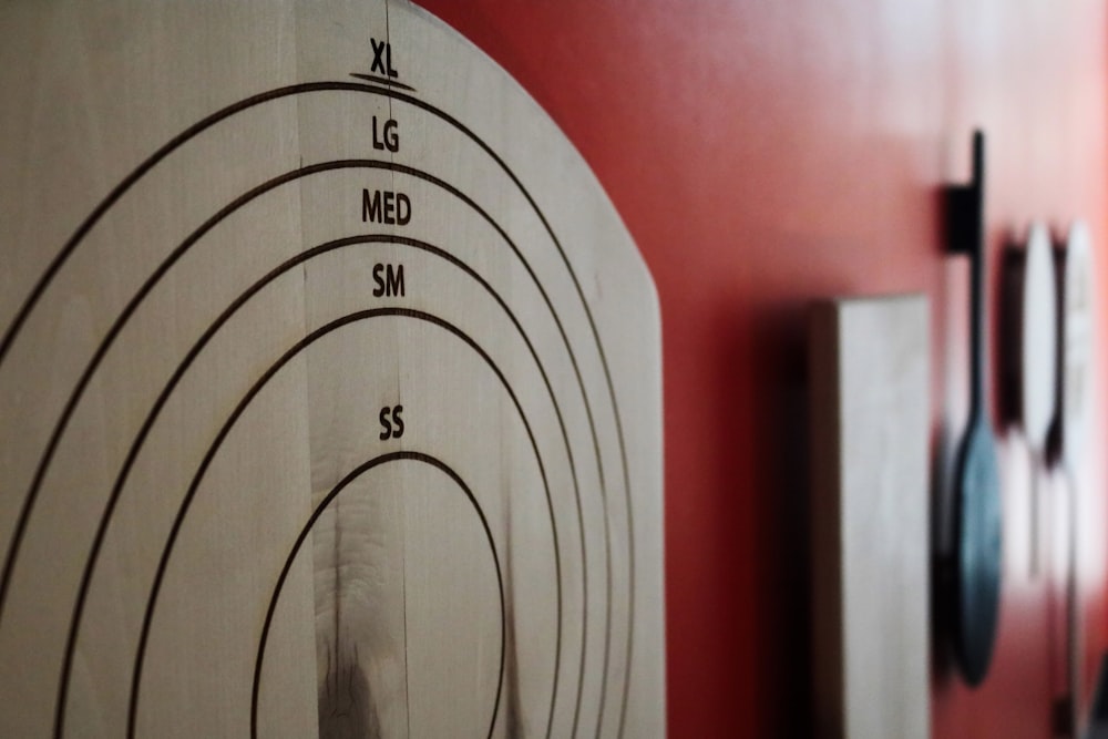 a close up of a wall with a clock on it