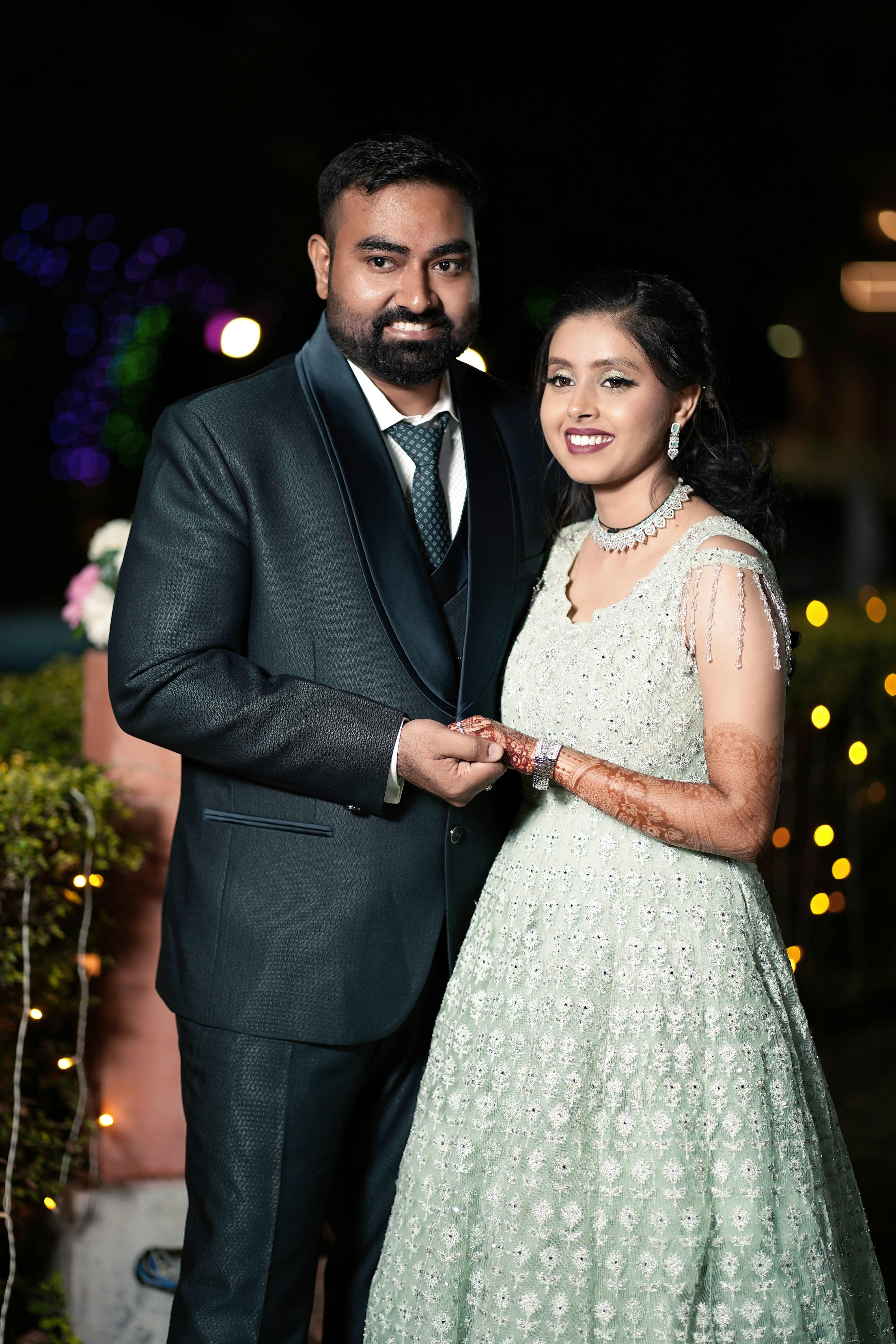 a man and a woman standing next to each other