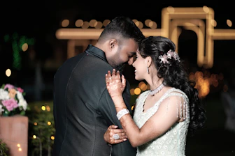 a man and a woman standing next to each other