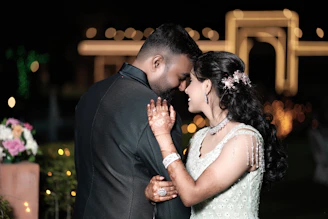 a man and a woman standing next to each other