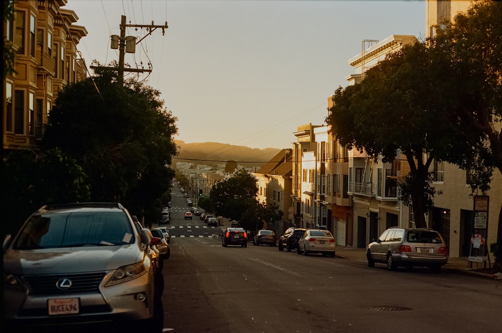 a street with cars parked on both sides of it