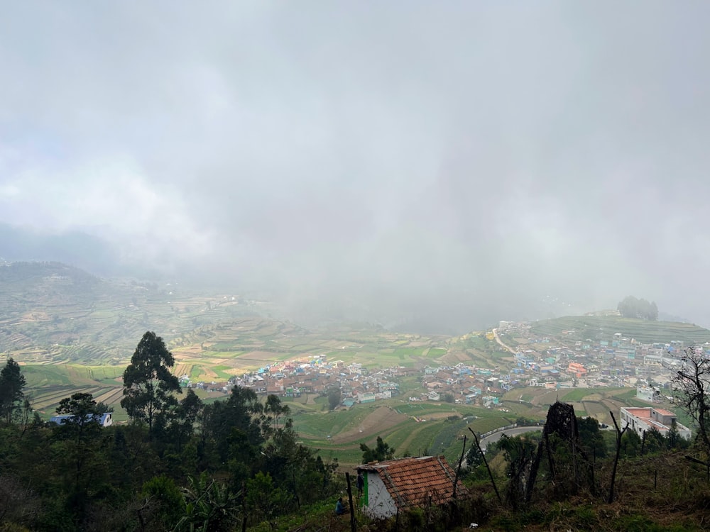 a view of a village from a hill