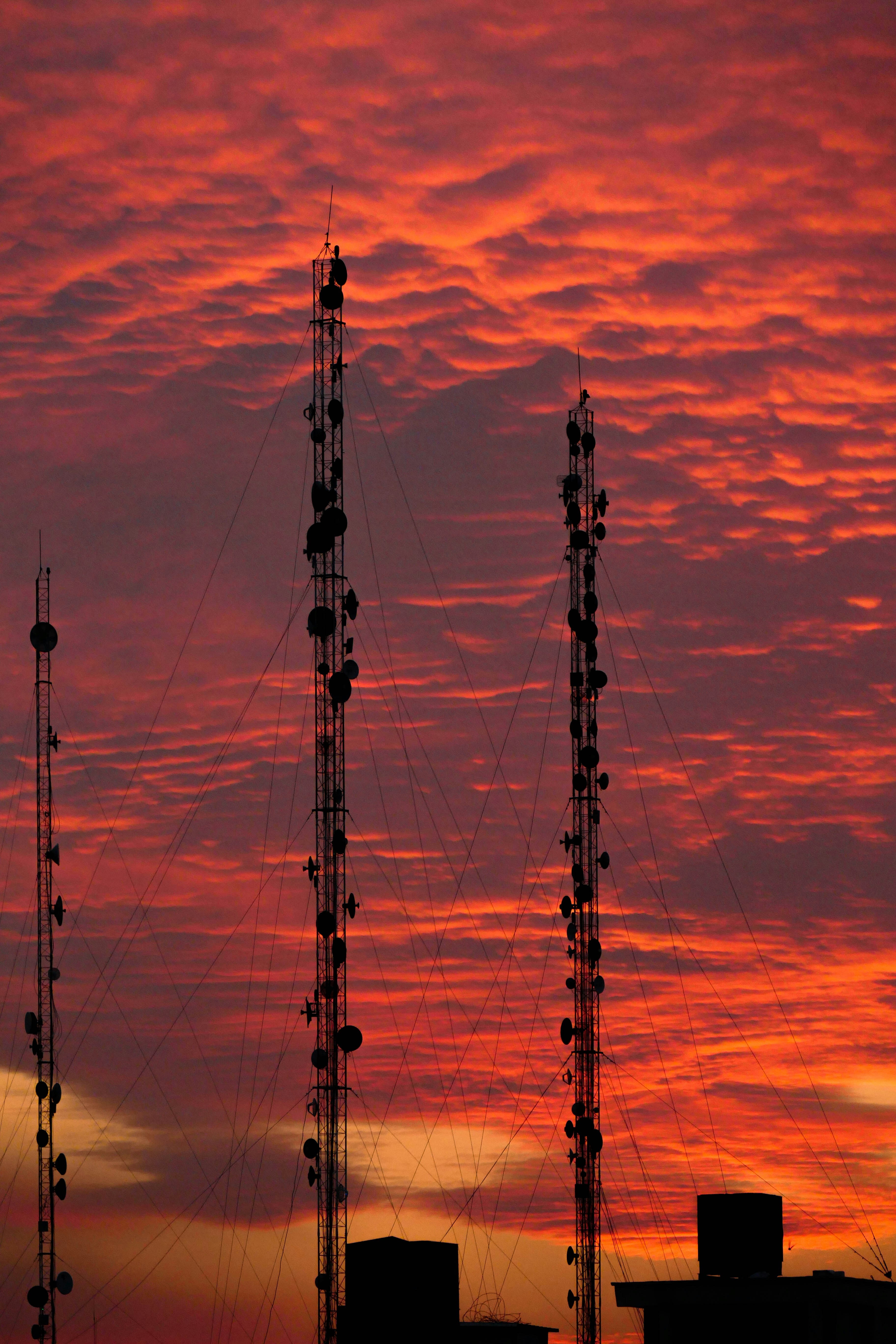 a very tall tower with a lot of antennas on top of it