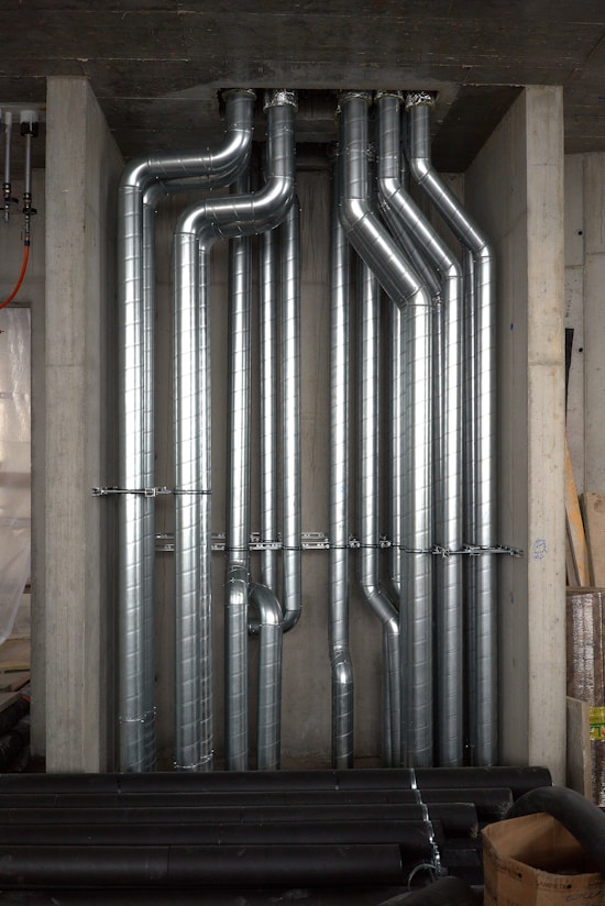 a bunch of pipes that are inside of a building