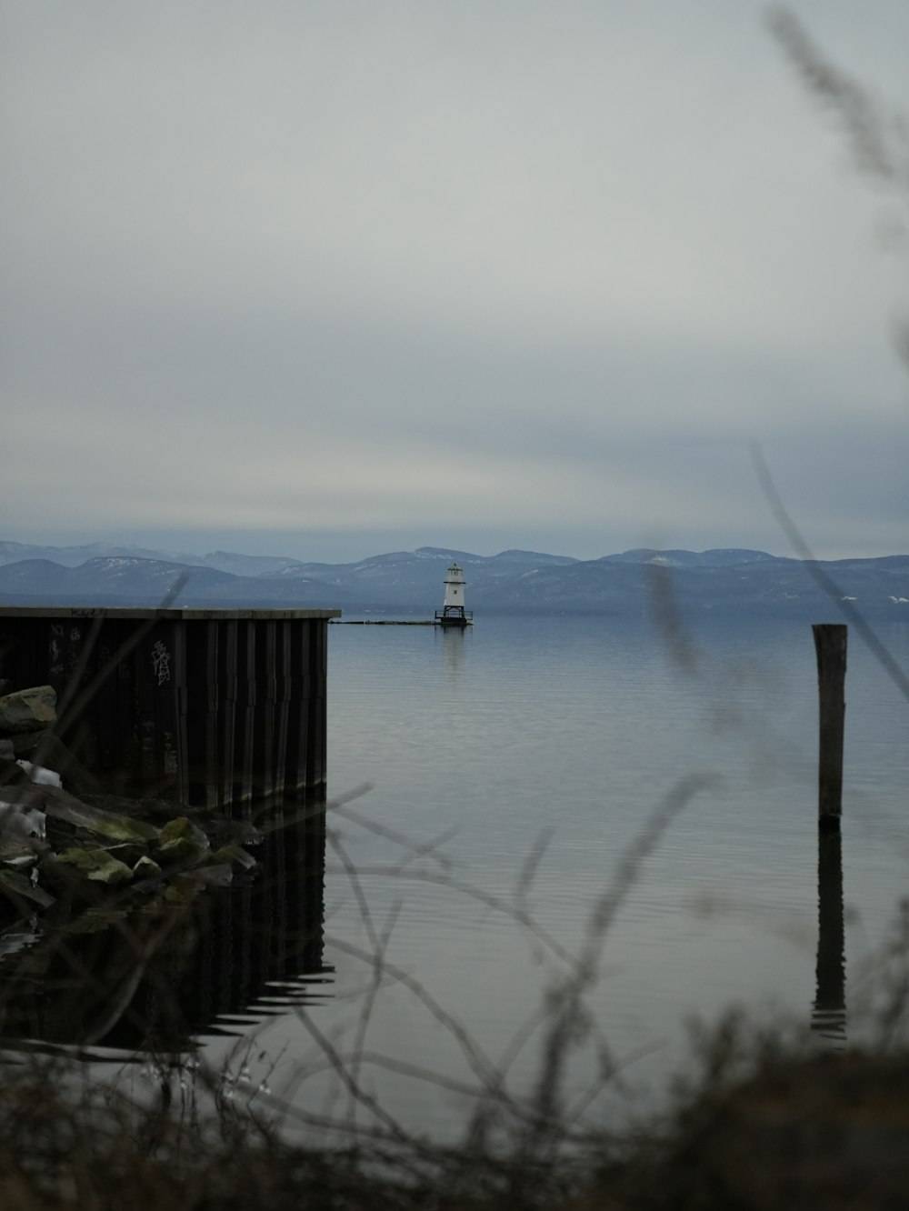 a boat is out on the water near a dock