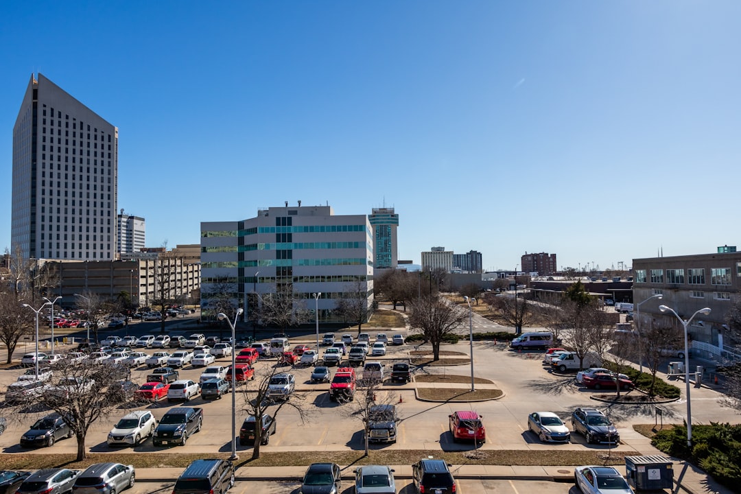 a parking lot with cars parked in it,