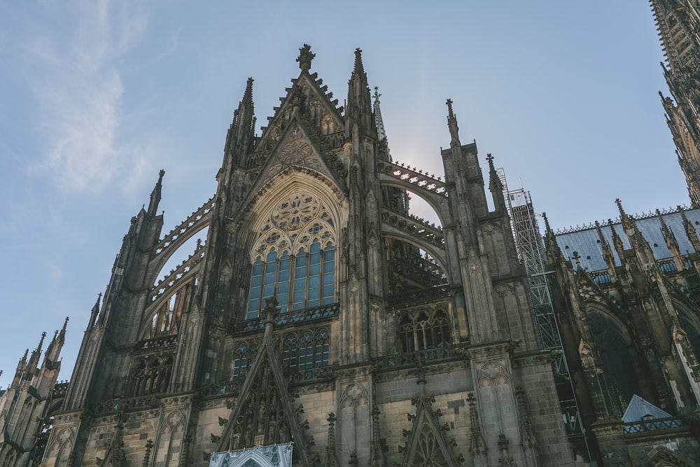 a large cathedral with a clock on the front of it