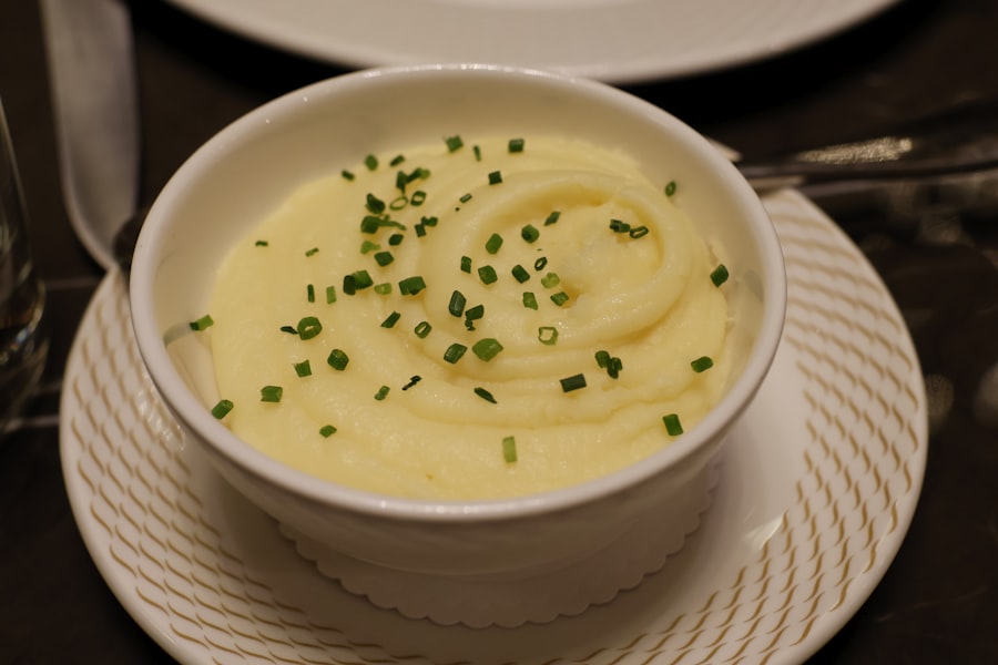 Bowl of buttery colcannon mashed potato with greens