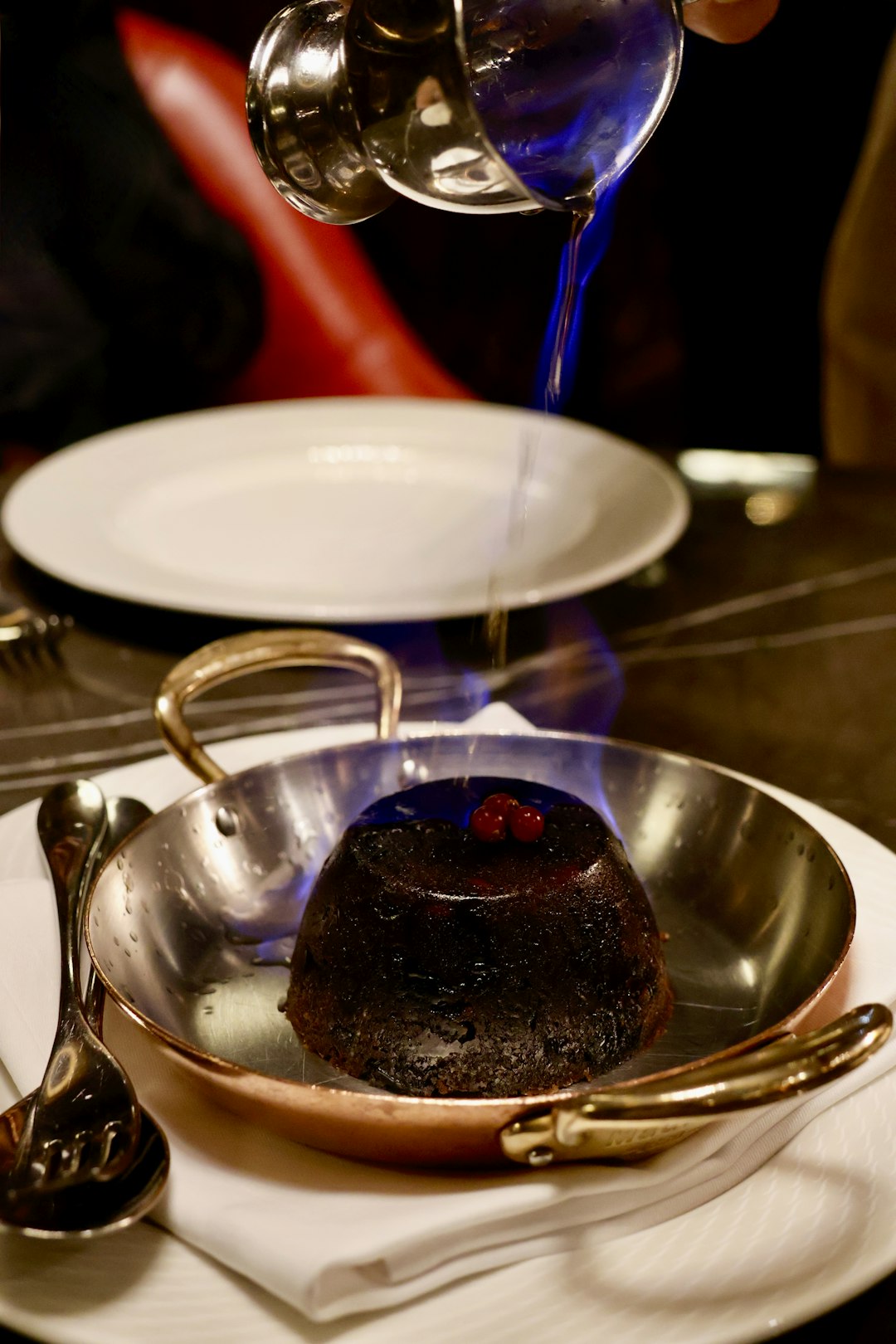 a plate with a piece of chocolate cake on it