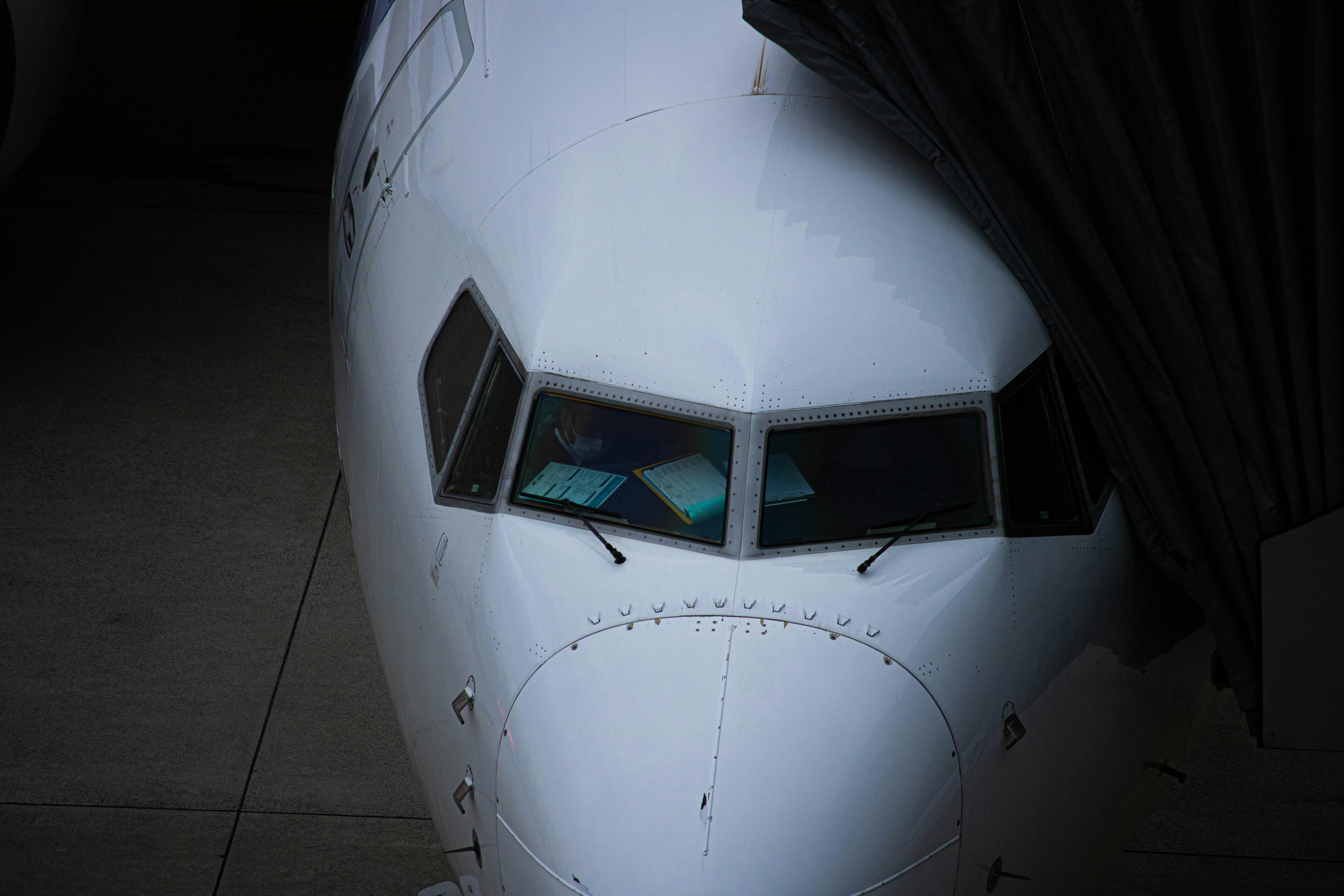 a close up of the nose of an airplane, 
