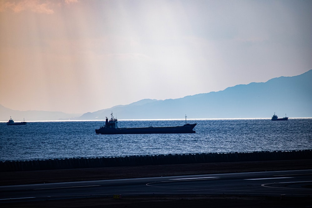 a large boat floating on top of a large body of water