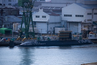 a large boat floating on top of a body of water