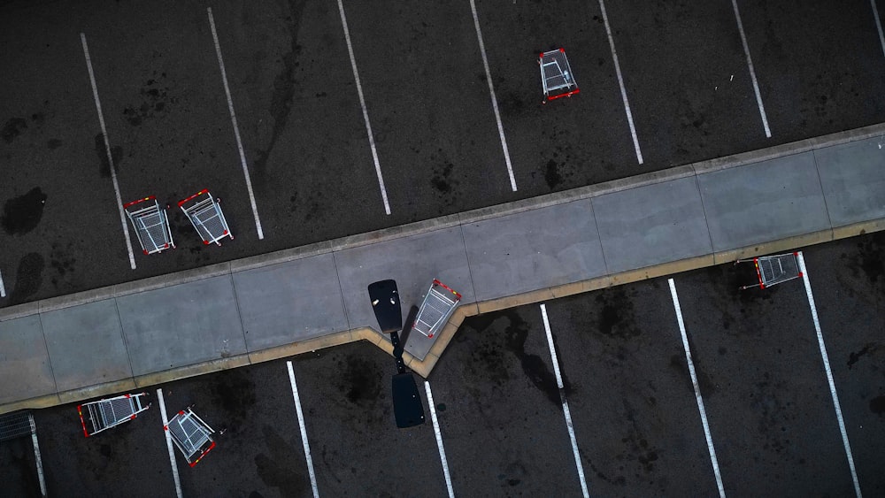 an overhead view of a parking lot with a parking meter