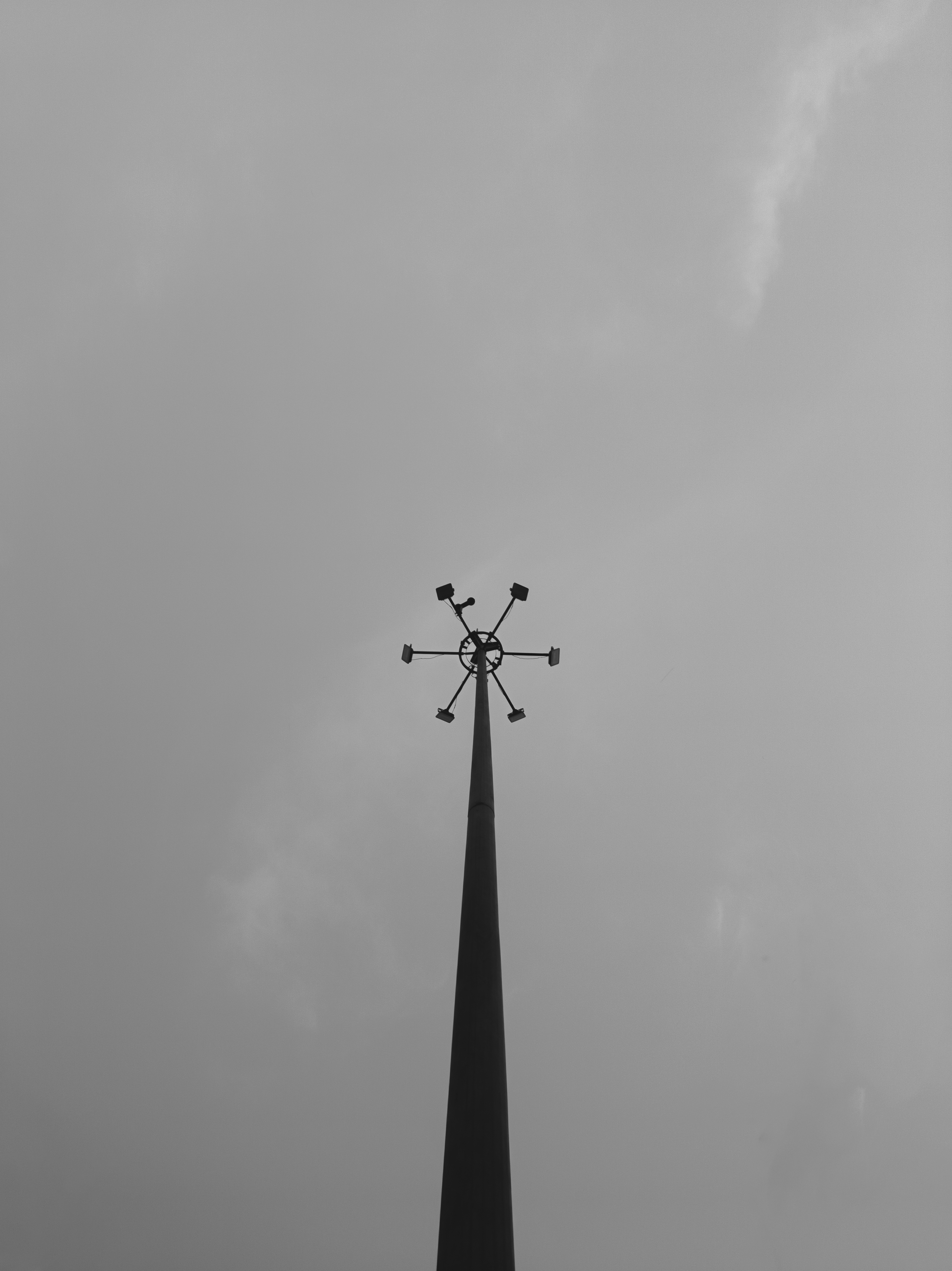 a black and white photo of a clock tower