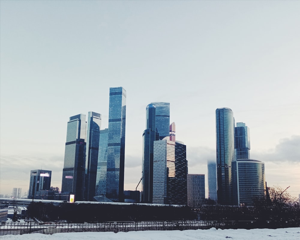 a group of tall buildings sitting next to each other