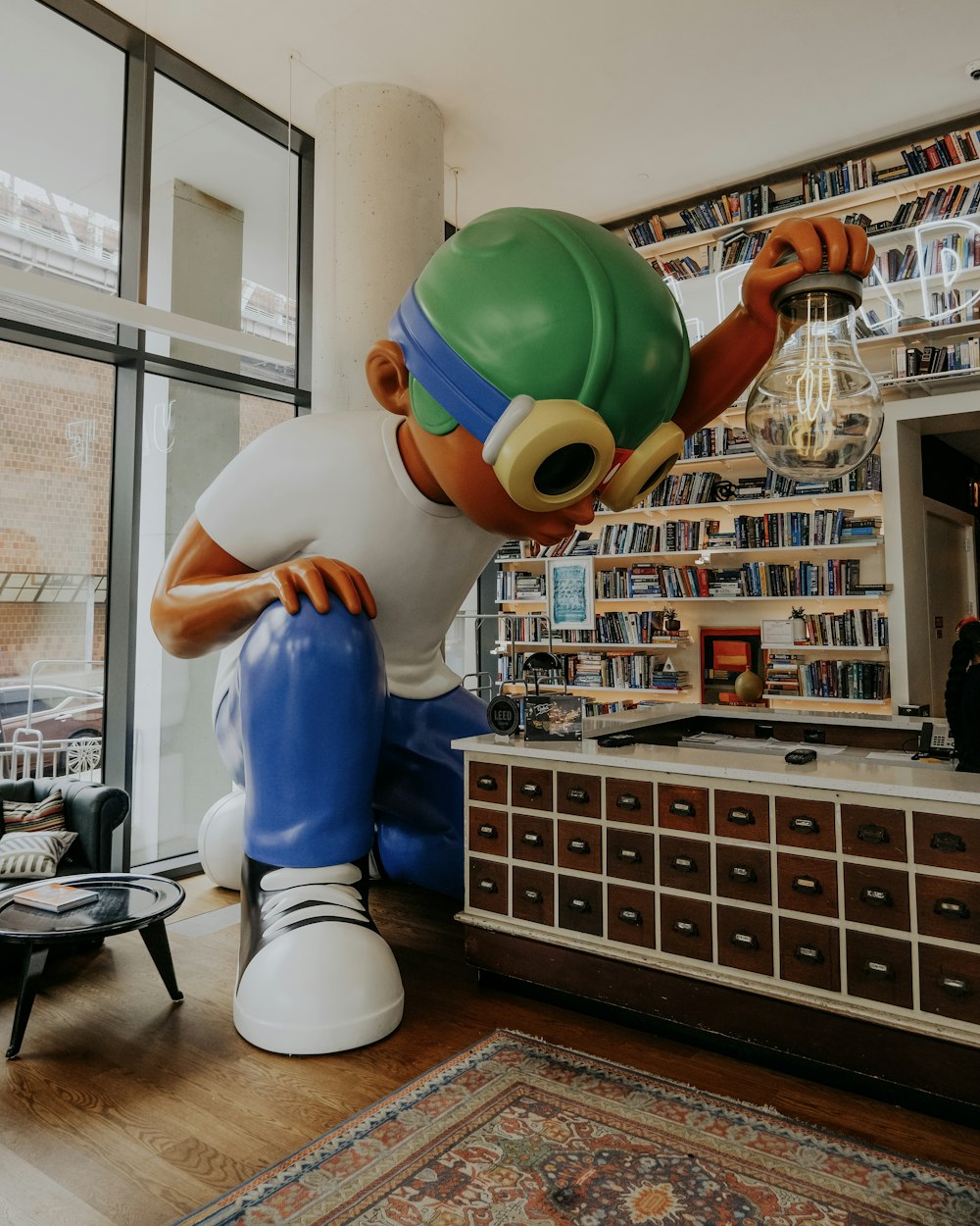 a large inflatable character sitting in a living room