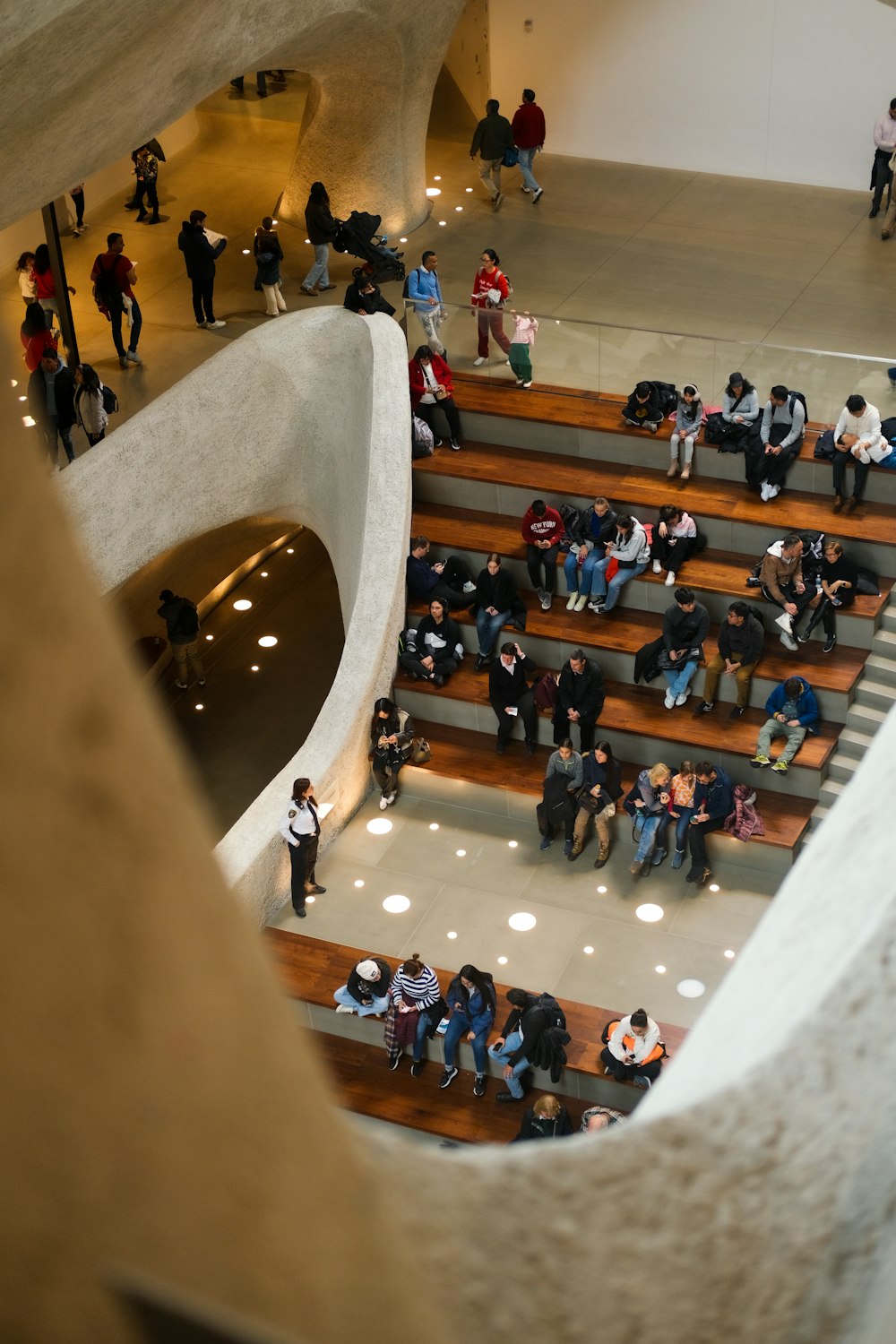 a group of people standing on the steps of a building