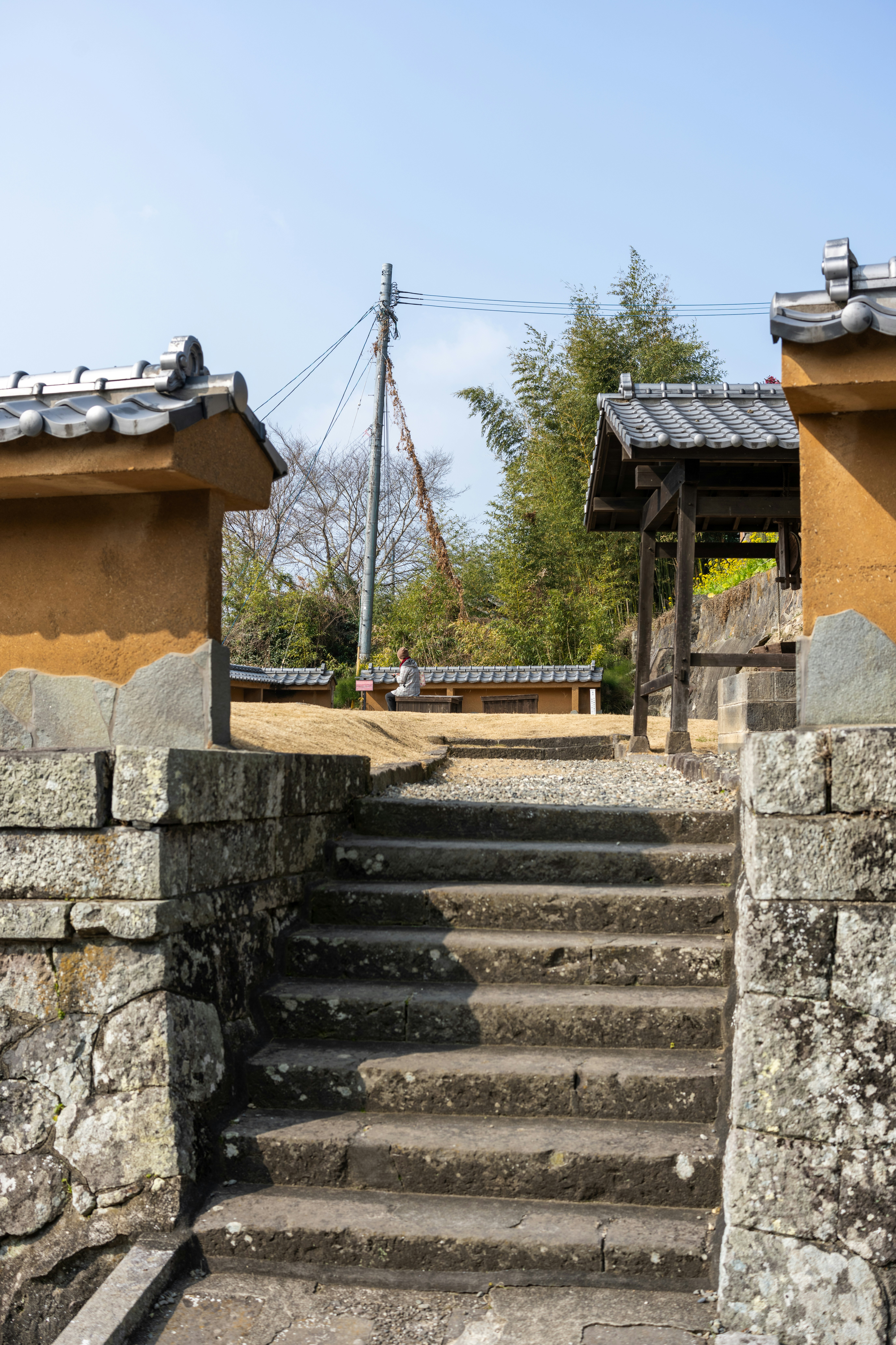 A set of stone steps leading up to a building photo – Free Human Image ...