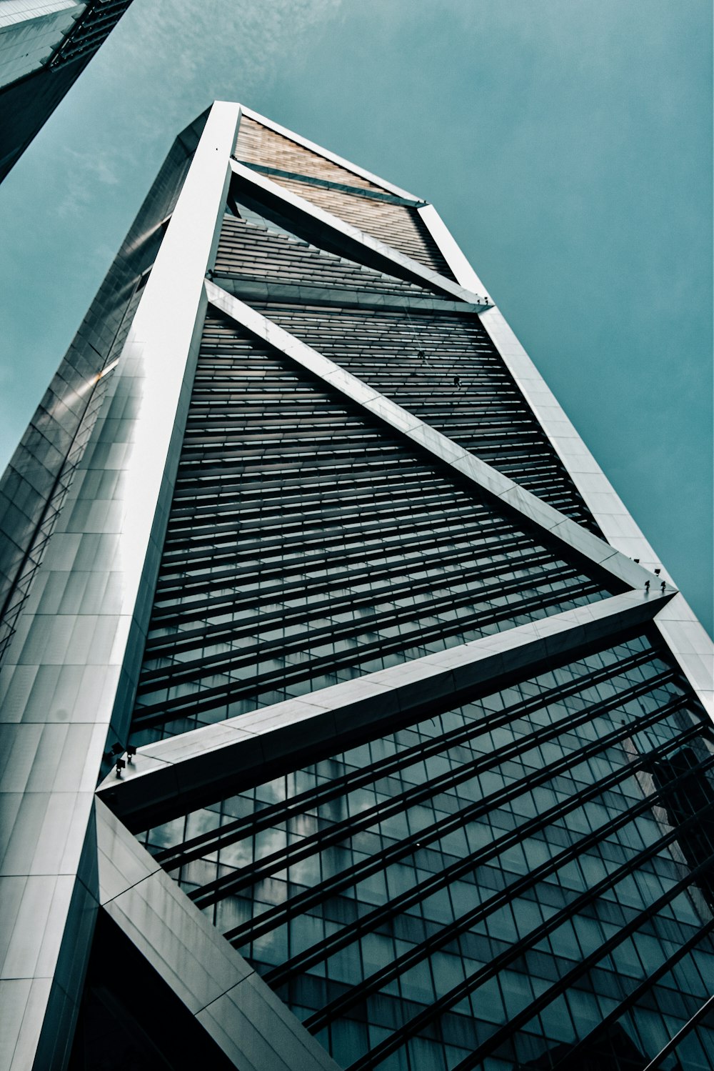 looking up at the top of a tall building